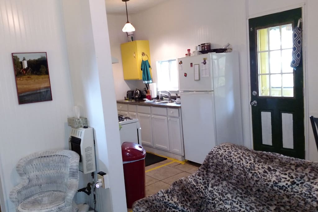 Viewing kitchen and back door from family room.