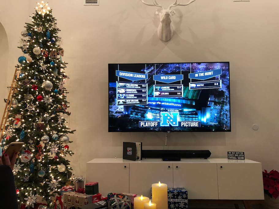 New 75" 4K TV and entertainment center