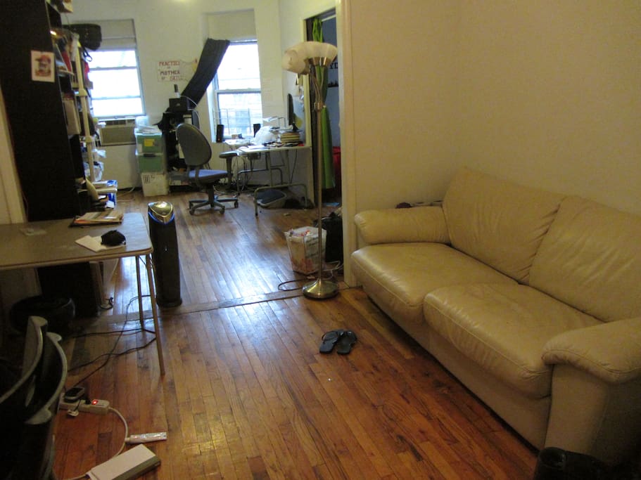 This is the living space with couch, connected to the room with a desk you can use