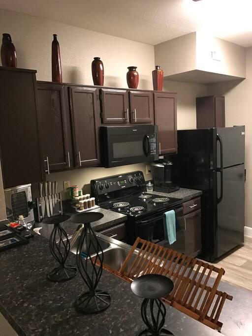 Kitchen w/Kuerig, toaster, dishwasher, fridge and microwave.