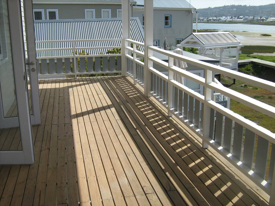 Patio leading off the upstairs bedrooms