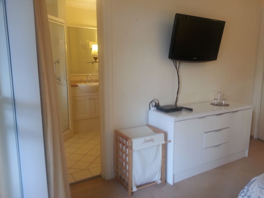 bedroom with ensuite, tv and dvd