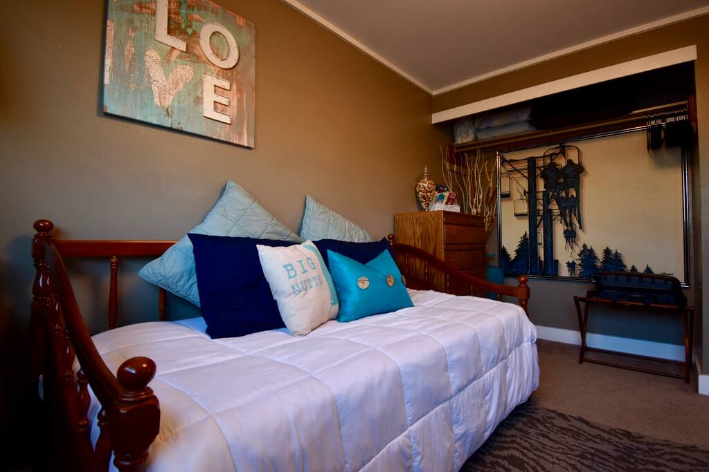 Your bedroom with closet view. Hangers and three (top) dresser drawers provided during your stay.