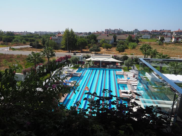 One bedroom pool view apartment in a luxury hotel