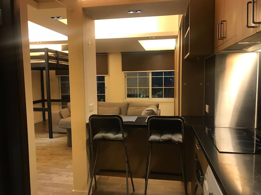 Spacious studio apartment with open bar