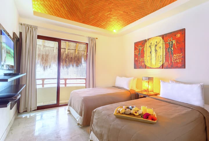 Treća spavaća soba s dva odvojena kreveta i kabelskom televizijom