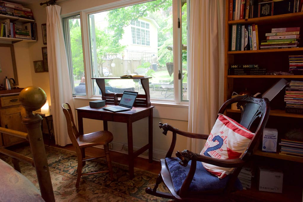 computer/writing desk with a view of the garden.