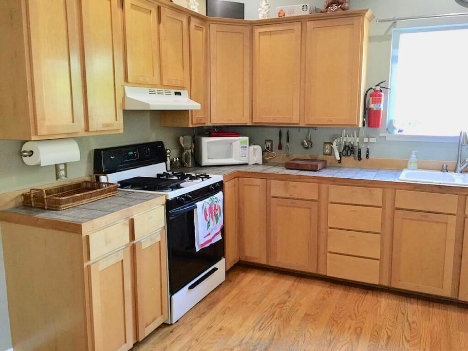We provide cooking and serving dishes and utensils, as well as a lighter wand for lighting the gas stove.
