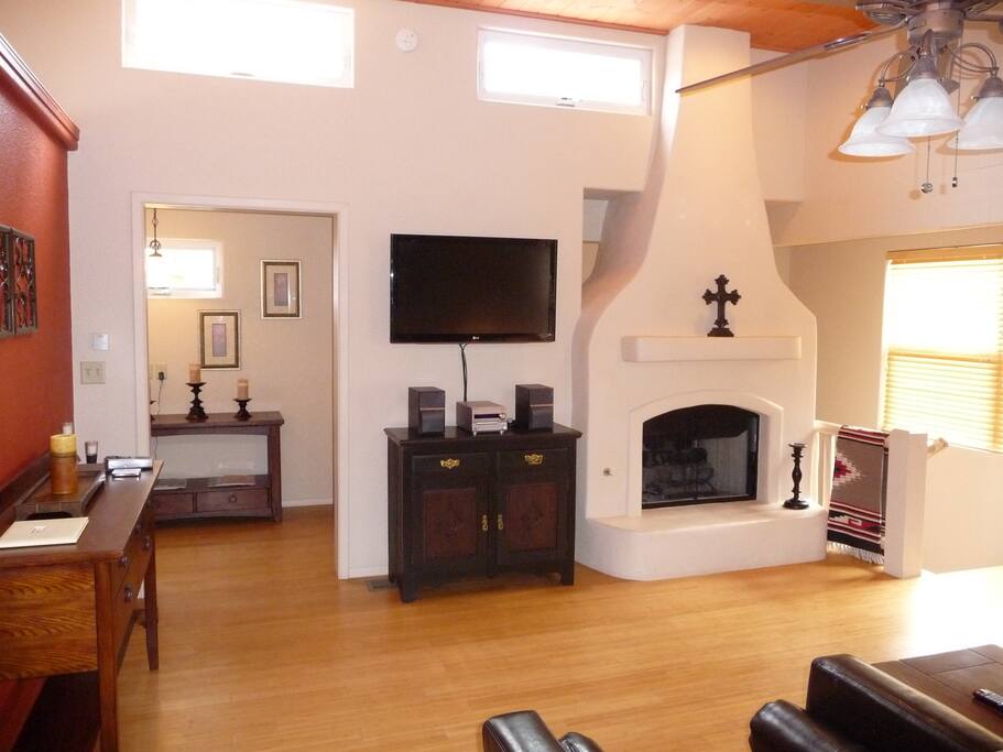 High ceilings, great light & a gas Kiva fireplace