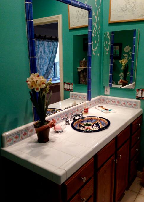 Enjoy a bath in the private bathroom after a day at the beach ...