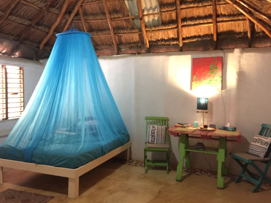 Cabin has two beds: one double and one single with mosquito netting