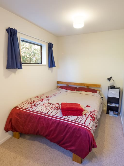 A warm and comfy double bedroom for you.