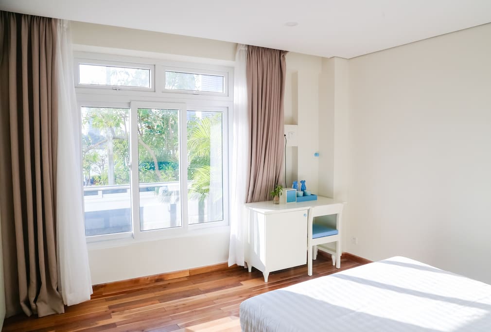 Bedroom 2 with river view and balcony