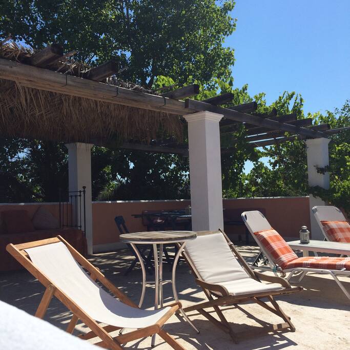 The rooftop is perfect for sunbathing or enjoying a meal in the shade