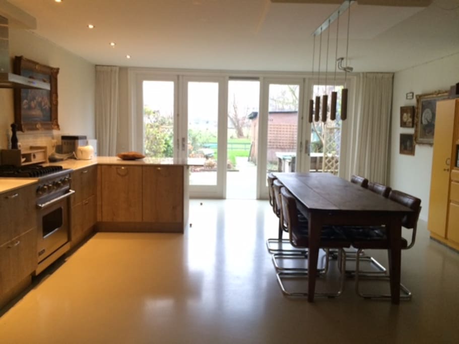 Living kitchen with doors to our garden