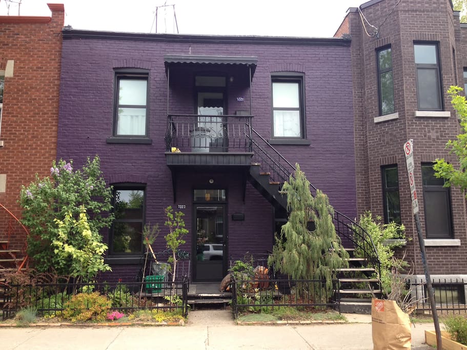 The apartment is on the ground floor of this purple 1920's house : )