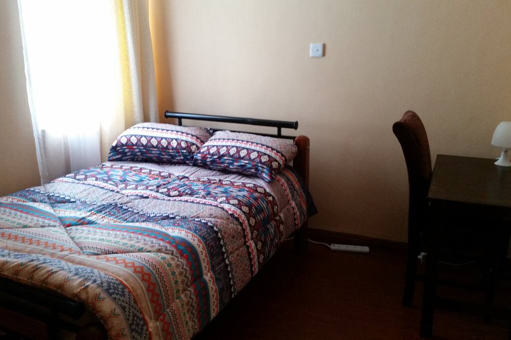 Spacious private bedroom, very serene with a work area