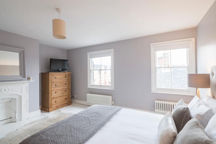 Second floor bedroom with king size bed.