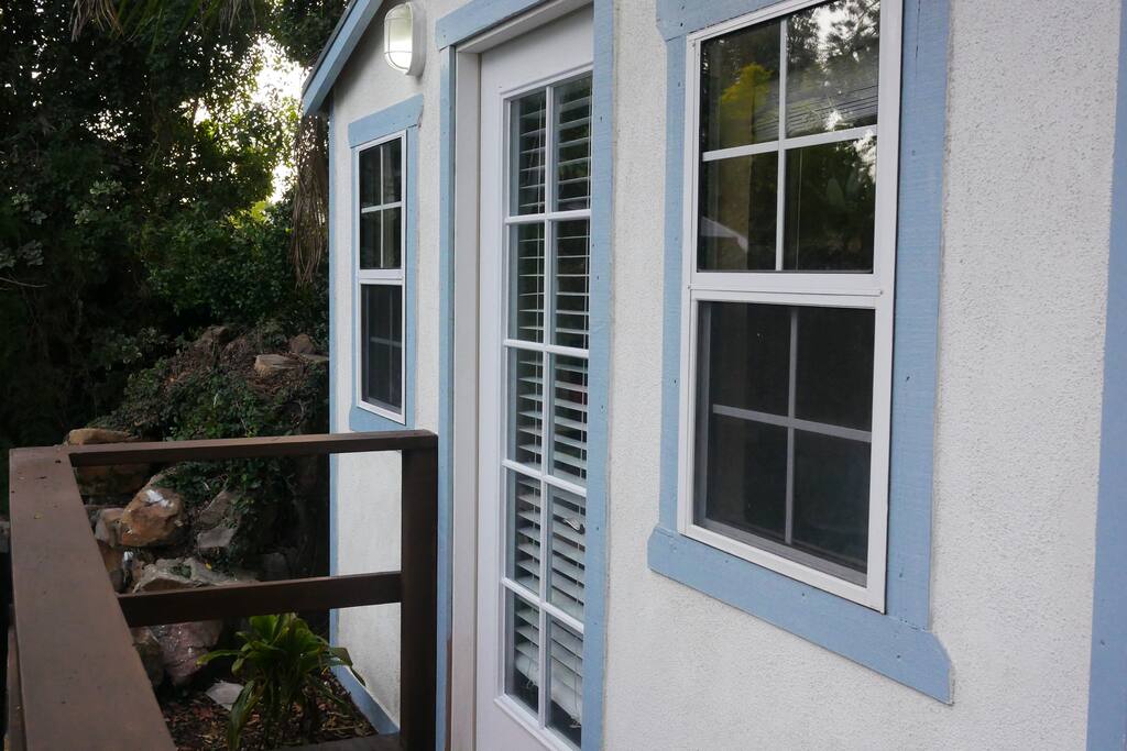 Bungalow deck entrance with code on door for extra security