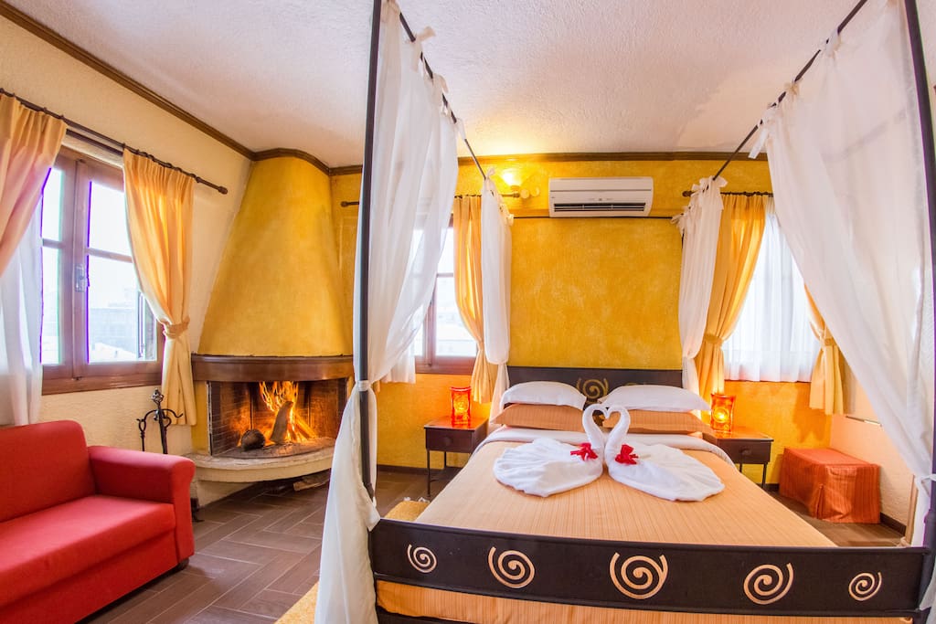 Double bed with fireplace and sofa bed for 1 person