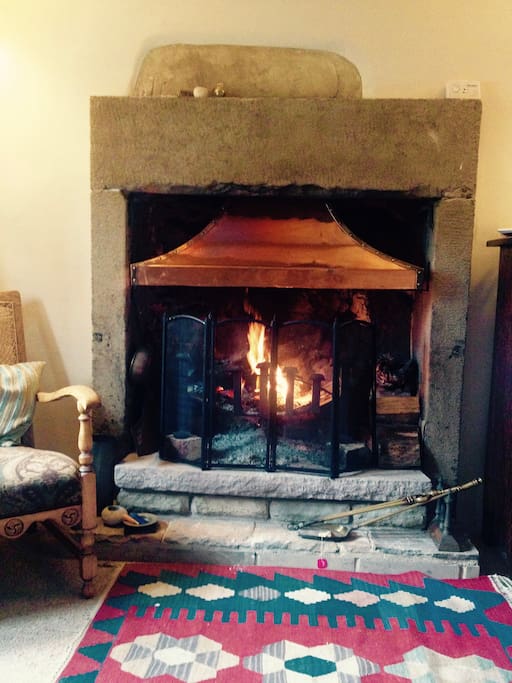 Snuggle up in front of a log fire.