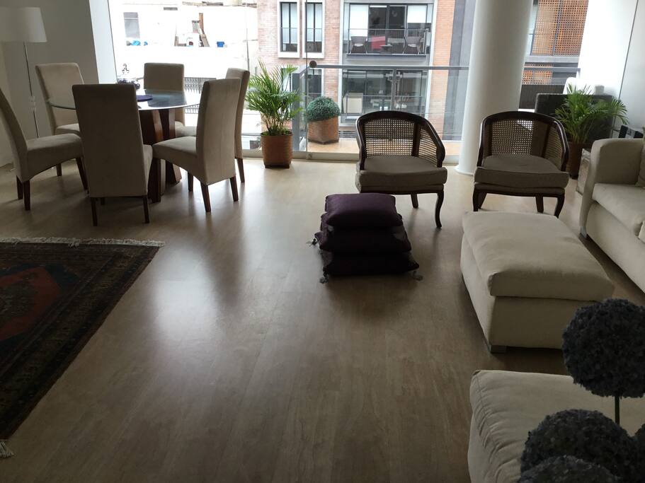 Living room/ dining room with balcony