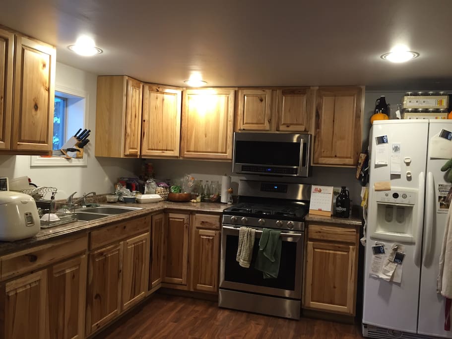 Well supplied kitchen. You can cook almost anything in here. Has microwave, gas range, rice cooker, toaster oven, digital kettle (no coffeemaker).