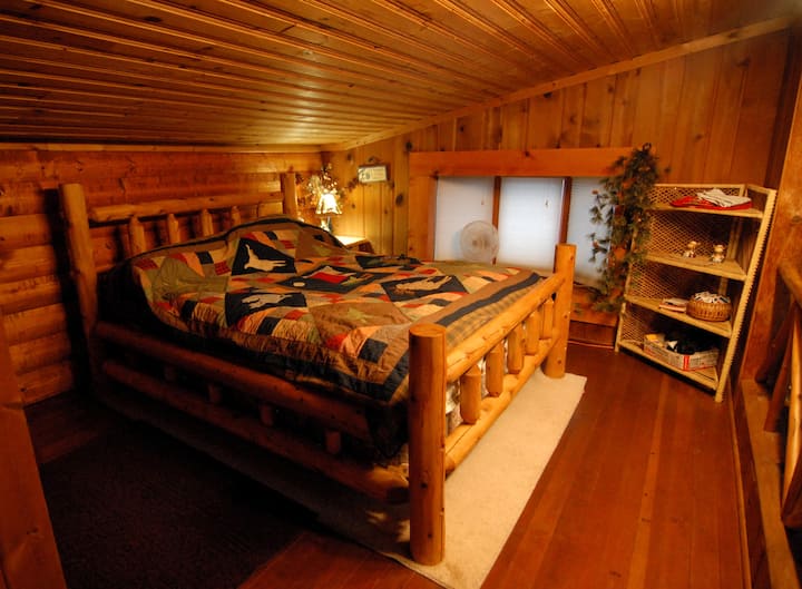 Lofted guest bedroom.