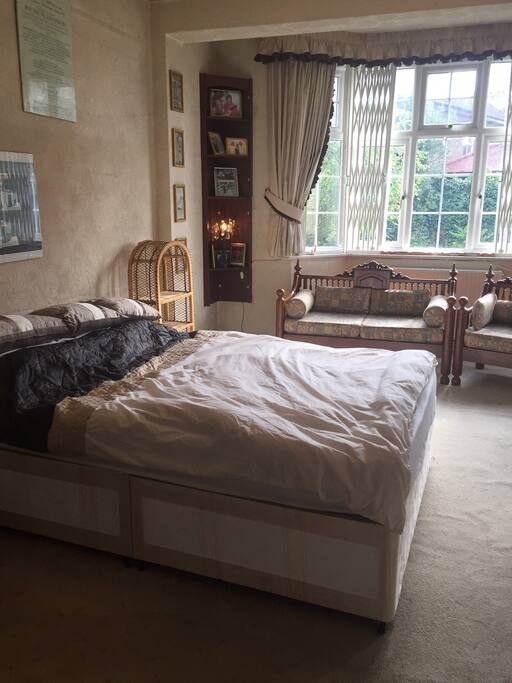 Very quiet room, you can walk out into the garden through your own private door. New low bed tables have been added, and a leather sofa