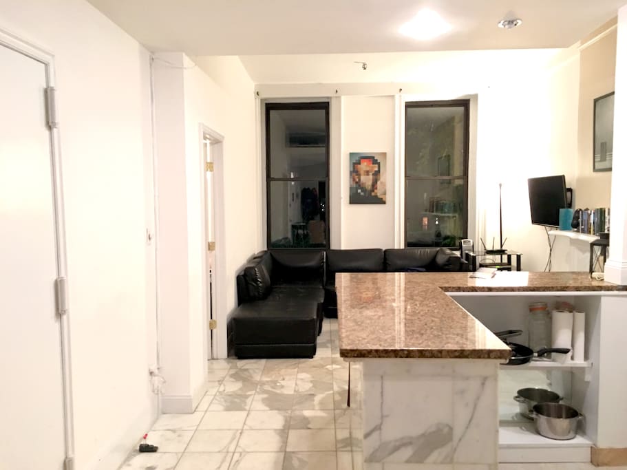 View from behind the kitchen of the living room.