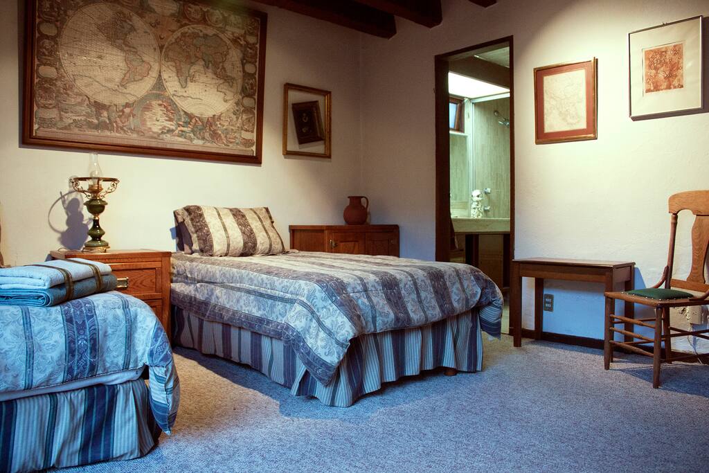 En-suite getaway: The adjoining bathroom has a tub for your convenience.