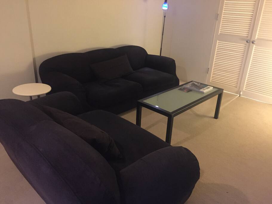 Shared living area with low comfortable designer sofas