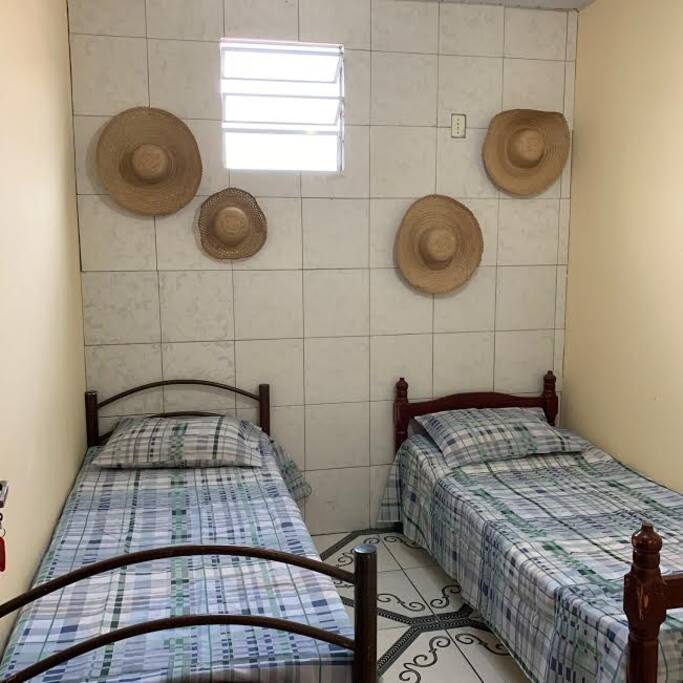 ROOM #9
-Located on the third floor (3 staircases)
-Shared bathroom/shower on the same floor (in the hallway)
-2 single beds
-No windows