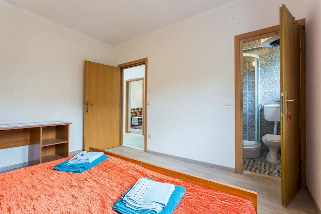 Master bedroom entrance and private bathroom