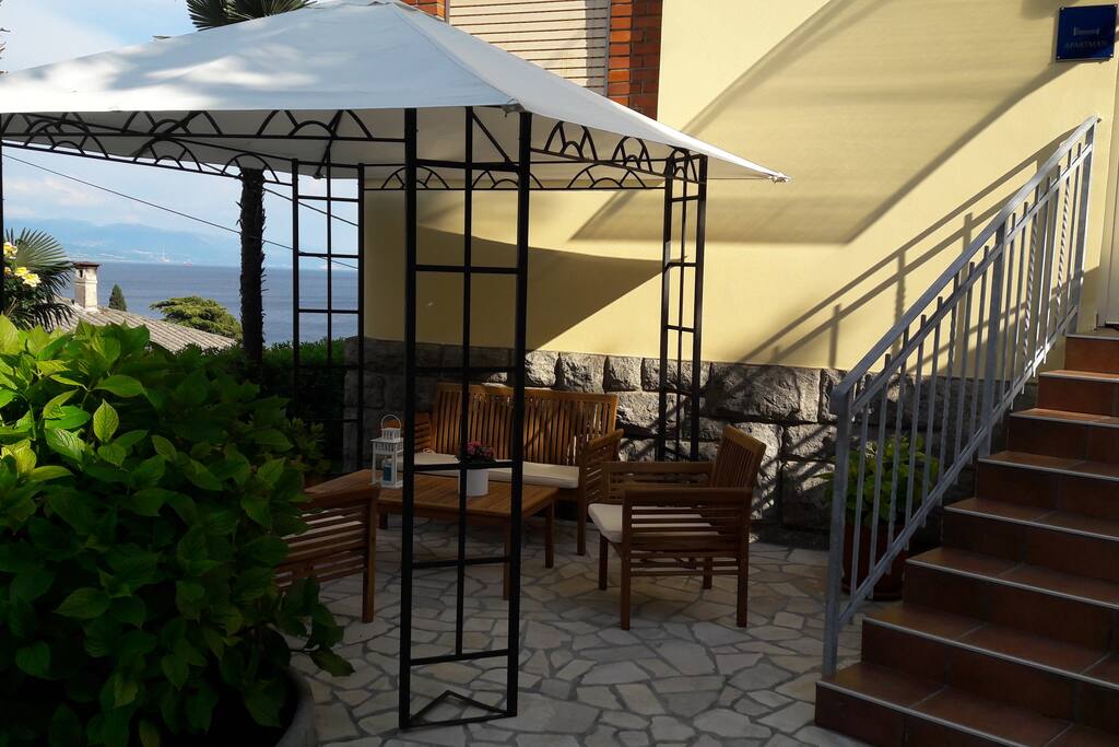 Entrance to the apartment with a small private terrace