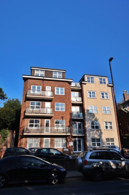 The apartment building, facing the park.