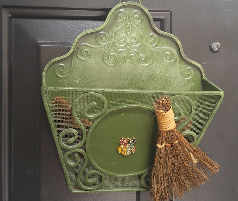 Envelope holder on Front door has Hogwarts Crest
