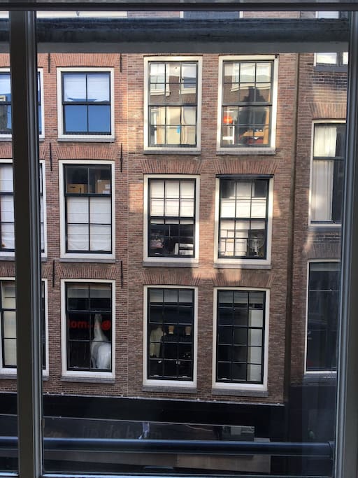 Looking out the window, into the historic shopping street