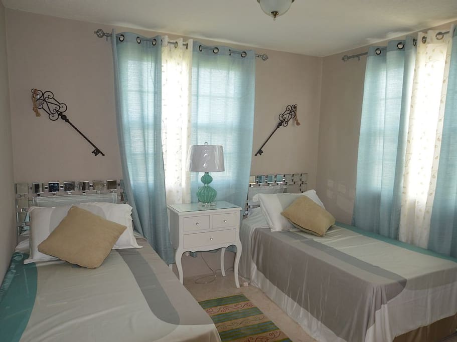 2 Single Beds (can be put together to make a king). Air conditioned.