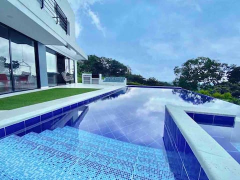 Modern and luxurious with pool and game room