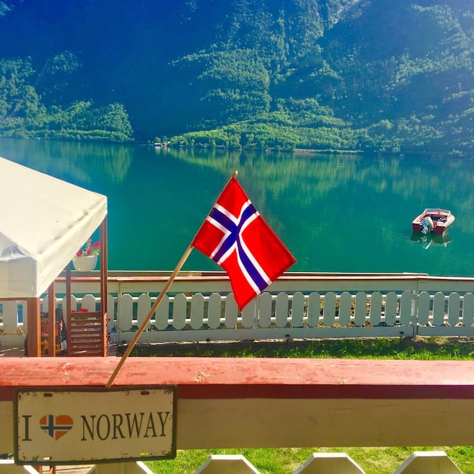 Amazing view of the fjord right infront of our apartment. Guests can access this area where in you can sit, grill or just relaxing and feel the spirit of the Norwegian fjord.
