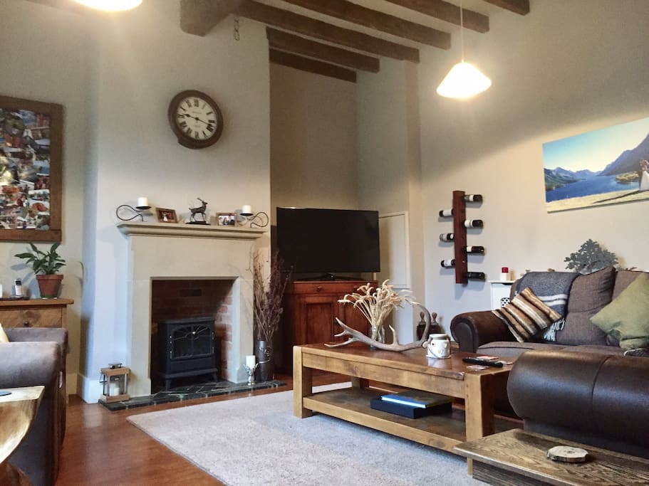 Living room - double height ceilings, feature window (see other pics)