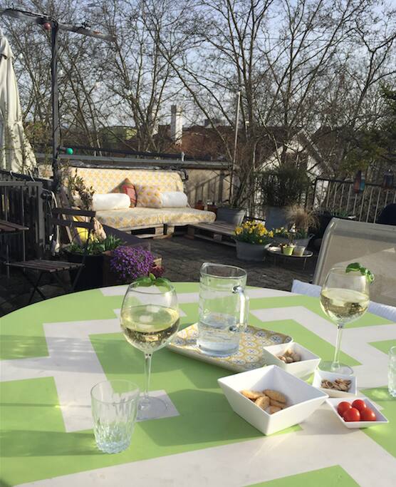 Afternoon drinks in the sun on the new sofa pillows