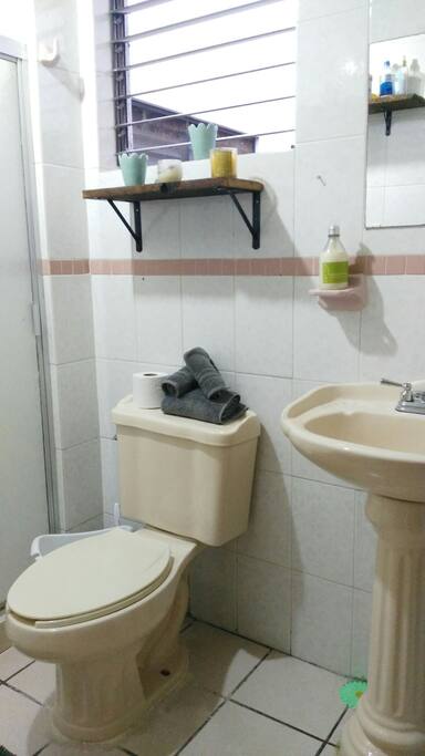 baño compartido