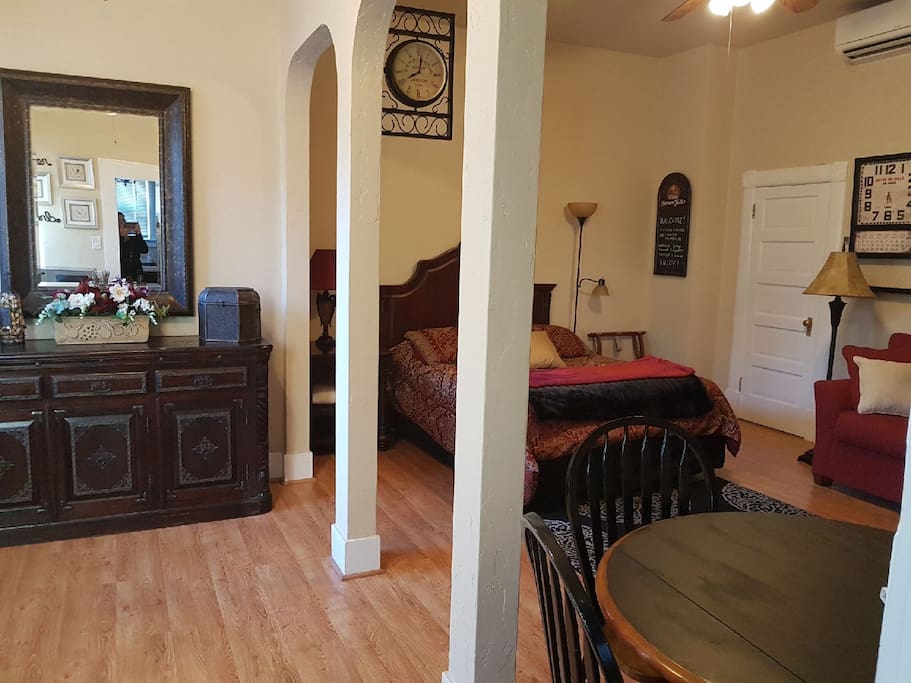 ...Suite 1 main studio space with a queen size bed..