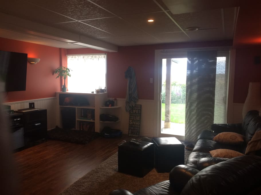 Walk out basement-- an area to hang out and watch TV away from the common space
