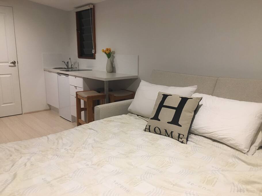 Queen size bed ideal for a couple or a single person.