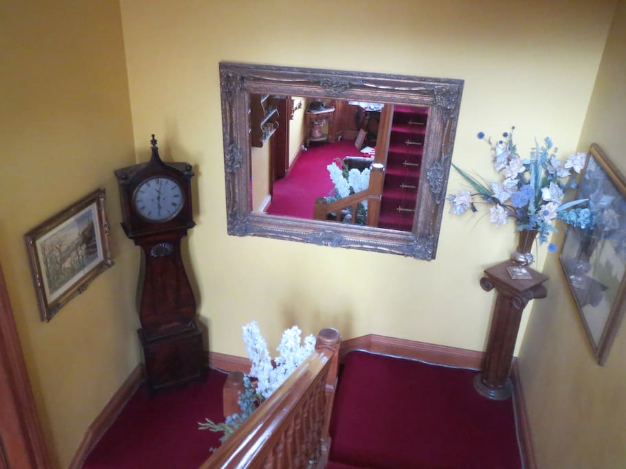 Hallway with lovely victorian staircase!