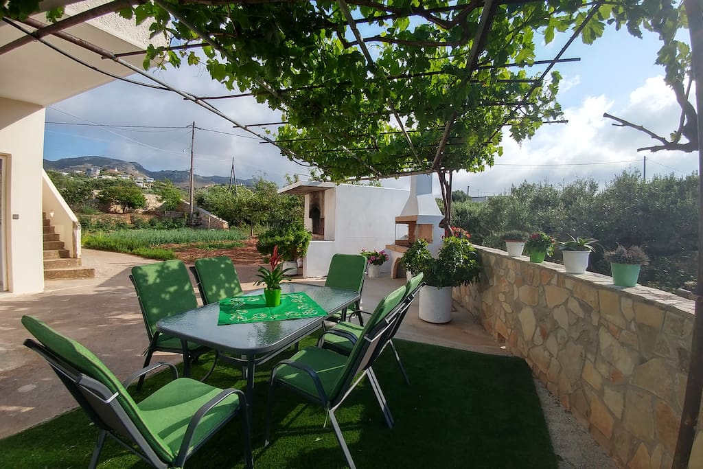 Private courtyard-garden with outdoor dining area, bbq and oven