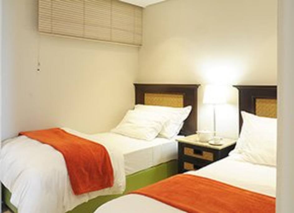 Rooms are cleaned services and made up every day. This is the smaller room if the two